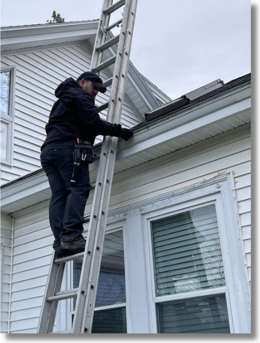 Certified home inspector performing moisture inspection in Maine
